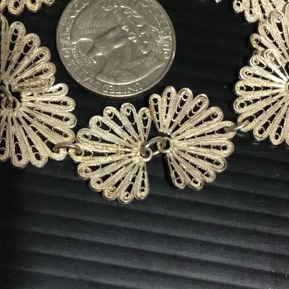 Beautiful ornate vintage fan or shell 8 inch sterling silver bracelet 17 grams
